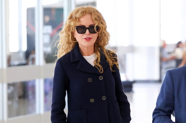 Nicole Kidman: was single, is single, and an airport coat